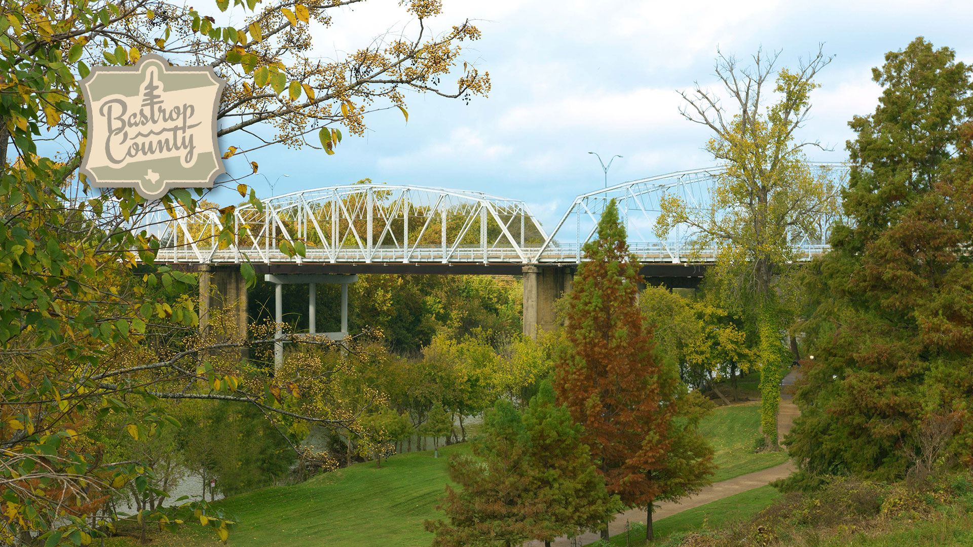 View of Bastrop Bridge from river banks